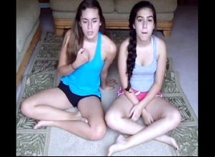 Puffy college girls trying yoga at home.